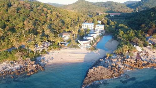 an aerial view of a house on a beach at Casa Bellavista in Ko Lanta