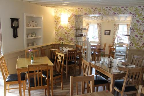 A restaurant or other place to eat at THE FIRS B&B &TEA ROOM