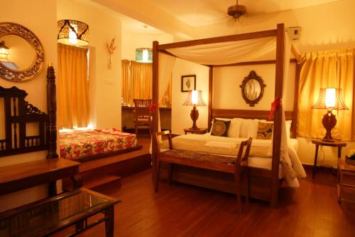 Ein Bett oder Betten in einem Zimmer der Unterkunft Hotel Villa Highnest - Oragadam -Sriperumbudur