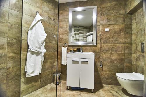 Koupelna v ubytování Perla Residence Hotel & SPA