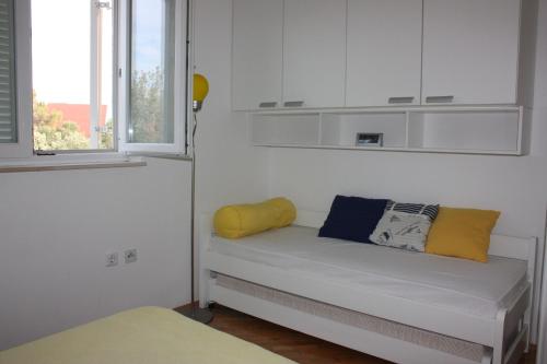 Postel nebo postele na pokoji v ubytování Apartments JTV Simuni