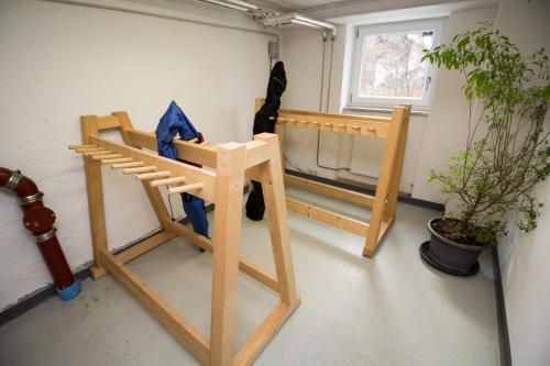 a room with a bunk bed with a cat sitting in it at Jugendherberge Lenggries in Lenggries