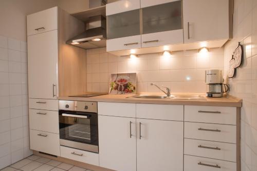 Una cocina o cocineta en Fewo Obsthof Matthies