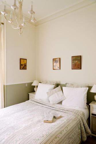 Кровать или кровати в номере Hotel Villa Rivoli