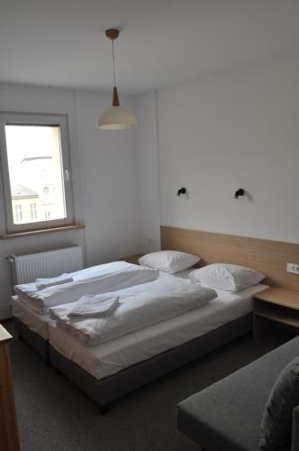 Un ou plusieurs lits dans un hébergement de l'établissement OperaHostel