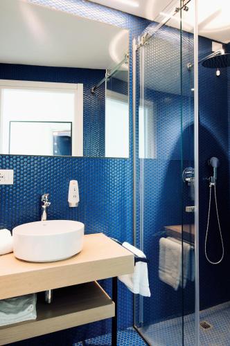 Salle de bains dans l'établissement Air Rooms Rome Airport by HelloSky
