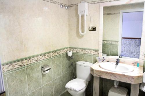 Kúpeľňa v ubytovaní Hotel Univers