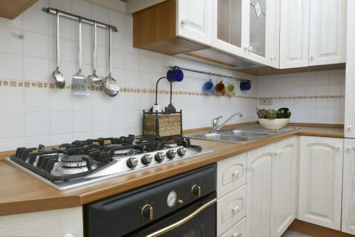 Kuchyň nebo kuchyňský kout v ubytování La casa dell'Avvocato by Wonderful Italy