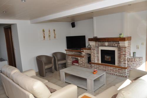 TV a/nebo společenská místnost v ubytování Vakantiewoning Leberg