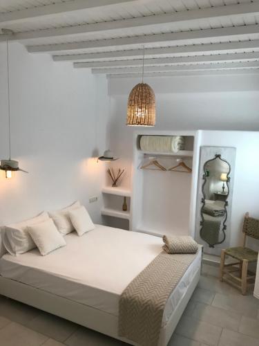 Ένα ή περισσότερα κρεβάτια σε δωμάτιο στο Mykonos Unique Apartment 