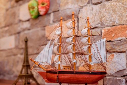 a wooden model of a ship on a wall at Villa TN - Fethiye in Fethiye