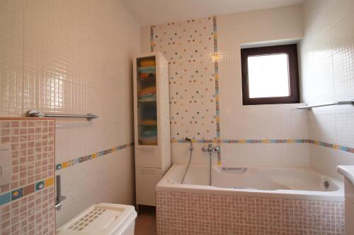 Kúpeľňa v ubytovaní Apartman San Marino 2