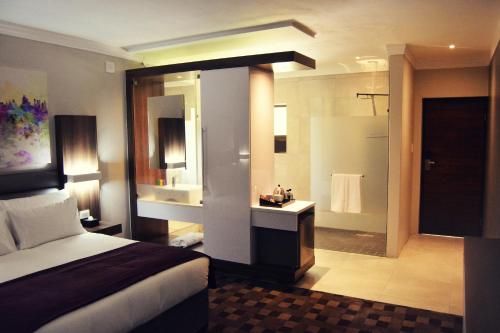 Postelja oz. postelje v sobi nastanitve Palm Swift Luxury Accommodation