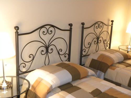Een bed of bedden in een kamer bij B&B Residenza Umberto