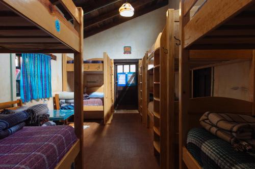 Postel nebo postele na pokoji v ubytování Posada del Abuelito (Hostel)