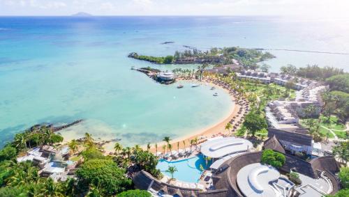 an aerial view of the beach at a resort at LUX* Grand Gaube Resort & Villas in Grand Gaube