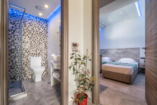 A bathroom at Savvas Luxury Suites