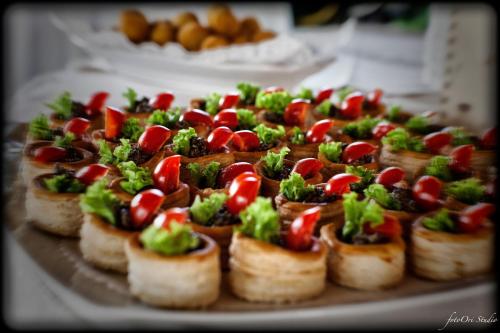 a plate of appetizers with broccoli and vegetables on it at Locanda Ristorante Gavarini in Bagnone
