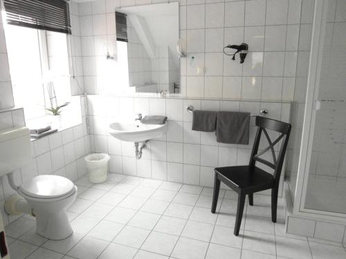 
Ein Badezimmer in der Unterkunft Hotel Frankfurter Hof
