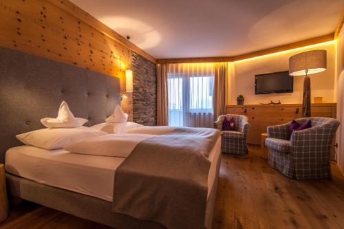 Ein Bett oder Betten in einem Zimmer der Unterkunft Hotel Zum Mohren