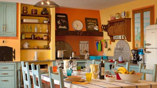 a kitchen with a table with bananas on it at Podere La Casina in Poppi