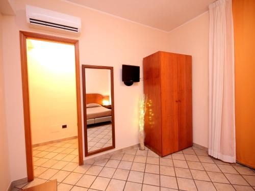 Ένα ή περισσότερα κρεβάτια σε δωμάτιο στο Villa Franca