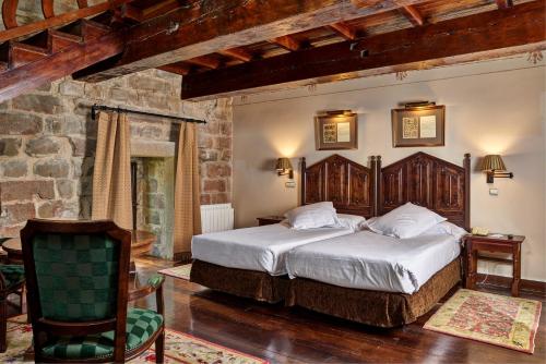 Katil atau katil-katil dalam bilik di Parador de Olite