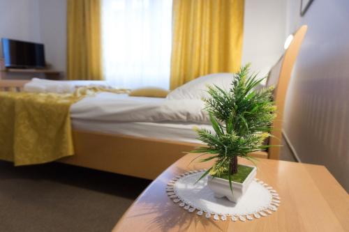 Ένα ή περισσότερα κρεβάτια σε δωμάτιο στο Restaurant and rooms Kotlar