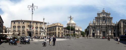 a group of people standing in a plaza in a city at b&b le 4 leggende in Catania