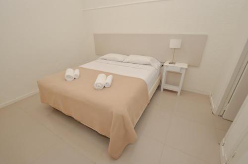 Postel nebo postele na pokoji v ubytování Hotel Acqua