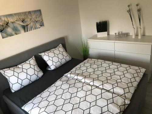 En eller flere senge i et værelse på Über den Dächern von Eisenach