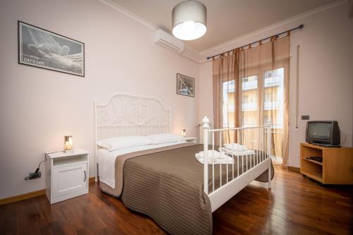 Posteľ alebo postele v izbe v ubytovaní Elettra Luxury Home