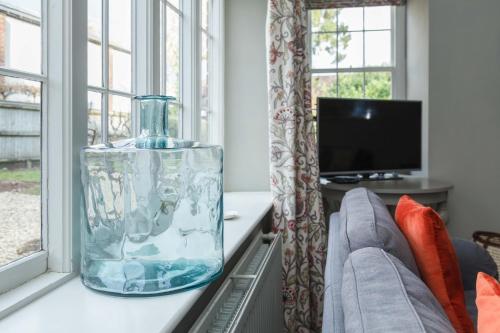 TV a/nebo společenská místnost v ubytování Gate House - Vivre Retreats