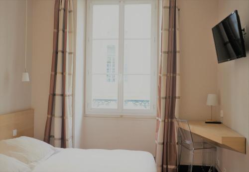 Hotel Gambettaにあるベッド