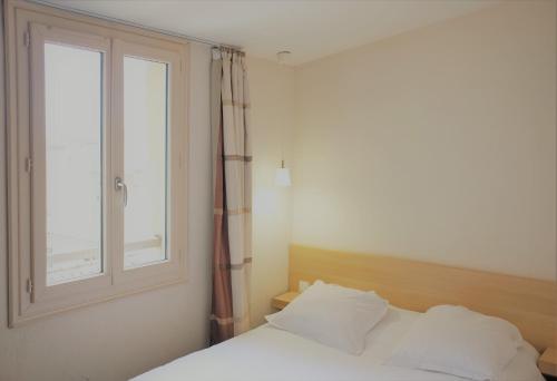 Hotel Gambettaにあるベッド