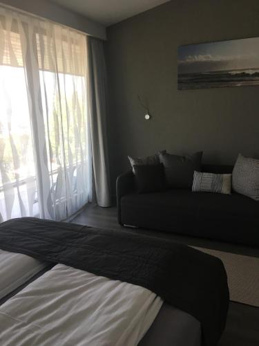 Galería fotográfica de Calypso Lakeside Rooms & Lux Apartments en Siófok