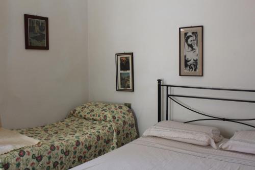 Llit o llits en una habitació de Il Capriolo