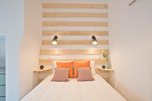 Säng eller sängar i ett rum på Lisbon Menta Apartment