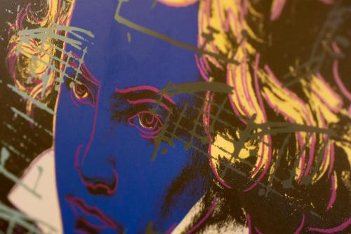 a painting of a woman with a blue face at Chambres d'hôtes La Moraine Enchantée in Aosta