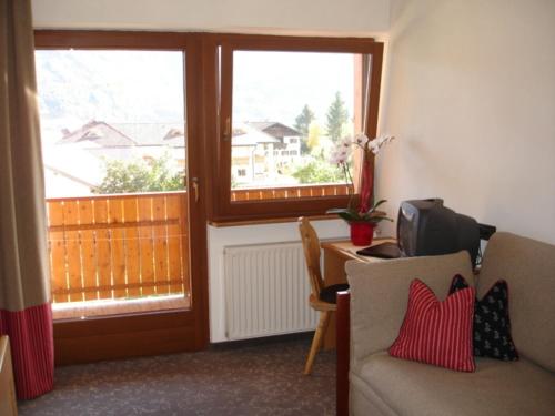 Posezení v ubytování Hotel Ploseblick
