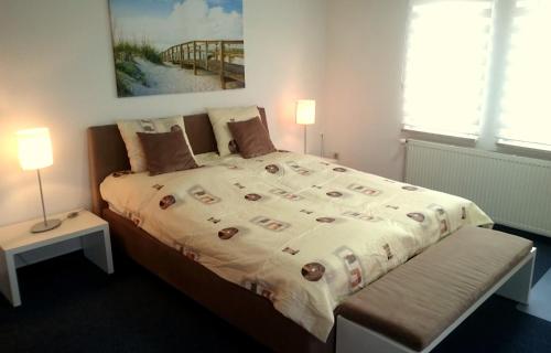 Säng eller sängar i ett rum på Ferienhaus "Harzblick"
