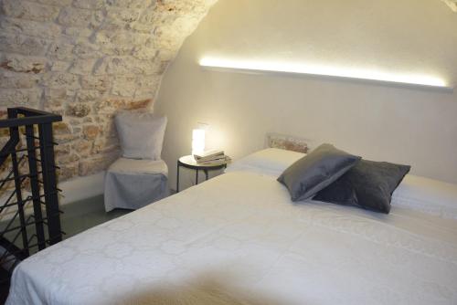 A bed or beds in a room at Dimora Le Zagare