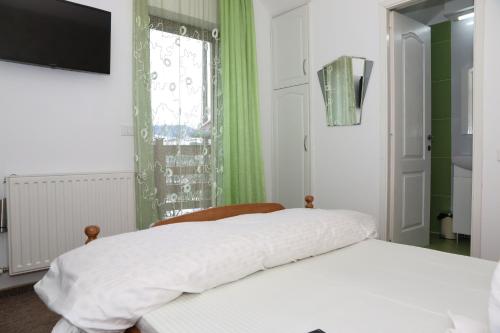Katil atau katil-katil dalam bilik di Casa Candea Sighisoara