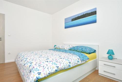 Ένα ή περισσότερα κρεβάτια σε δωμάτιο στο Apartment Dora