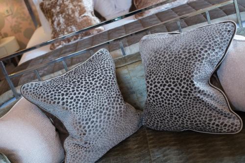 two pillows sitting on top of a shelf at Hogarths Stone Manor in Kidderminster