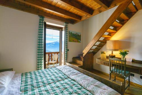 Postel nebo postele na pokoji v ubytování Agriturismo Giacomino