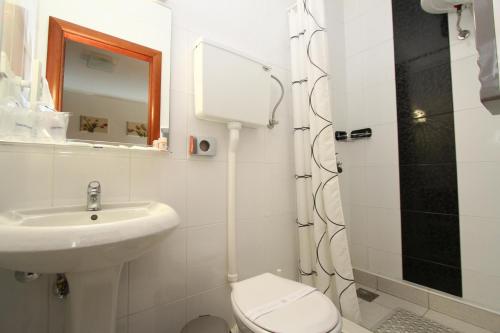 Koupelna v ubytování Guesthouse Villa Inn