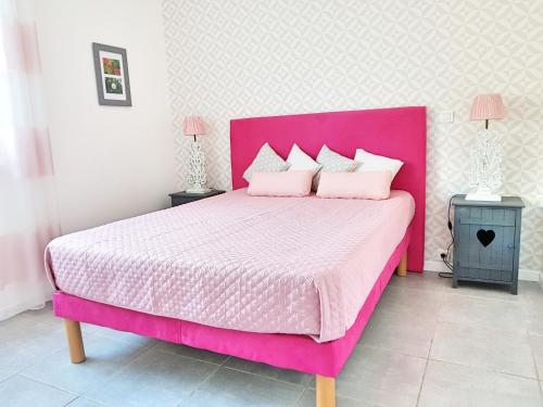 Ένα ή περισσότερα κρεβάτια σε δωμάτιο στο Villa Colombier