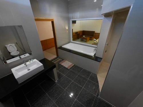Vonios kambarys apgyvendinimo įstaigoje Paradise Hotel