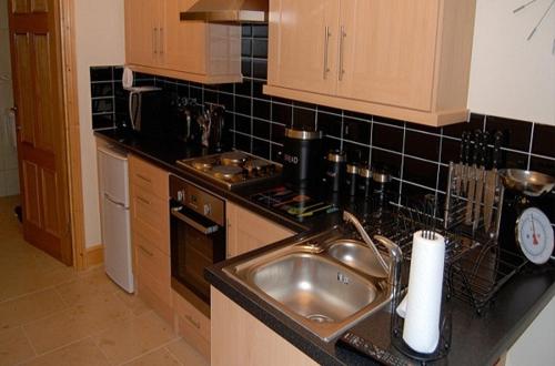Köök või kööginurk majutusasutuses Winchfawr Lodge